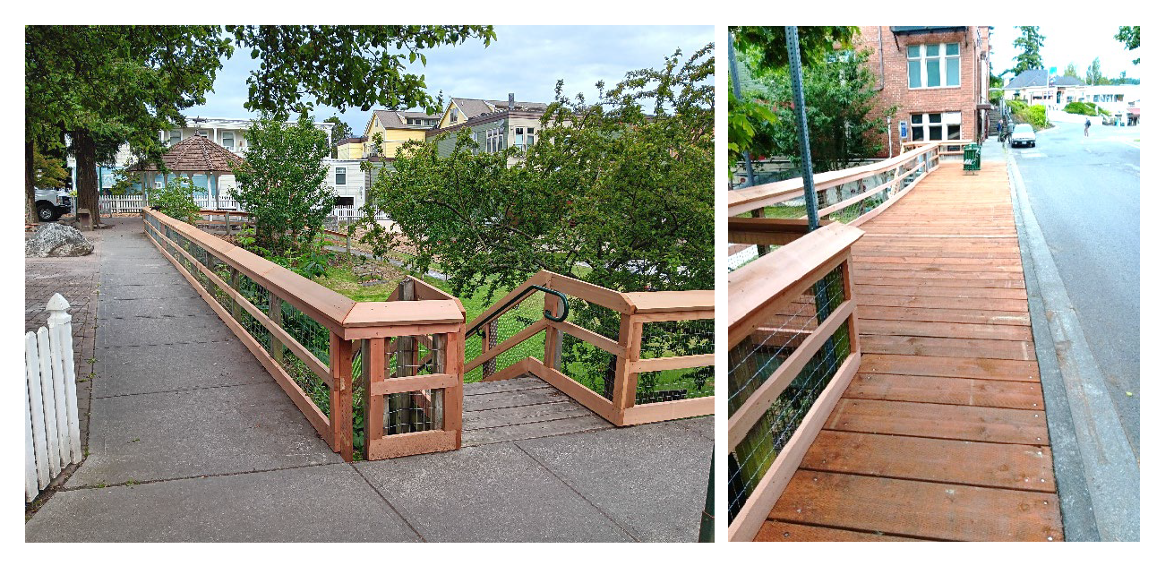 Sidewalk and wooden boardwalk with wood railing